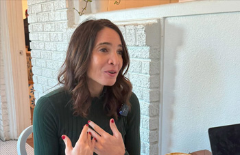TTU SOM faculty member Sarah Brinker at a coffee shop discussing lullabies